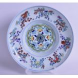 A CHINESE DOUCAI PORCELAIN CIRCULAR BOWL bearing Qianlong marks to base, painted with floral