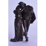 A 19TH CENTURY EUROPEAN BRONZE FIGURE OF TWO LOVERS modelled holding hands. 13 cm high.