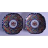 A PAIR OF 19TH CENTURY JAPANESE MEIJI PERIOD SQUARE FORM DISHES painted with flowers. 12 cm wide.