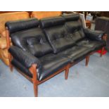 A LOVELY RETRO LEATHER BOUND SOFA with hardwood frame and angular legs. 193 cm wide.