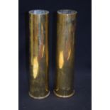 A PAIR OF WWII SHELLS. 35 cm high.