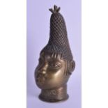 AN EARLY 20TH CENTURY AFRICAN IFE BRONZE HEAD modelled as a female. 27 cm high.