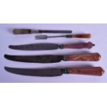 A GROUP OF FIVE 18TH CENTURY CONTINENTAL CARVED AGATE HANDLED UTENSILS possibly Russian. Largest