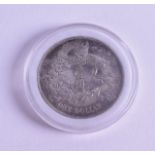 A CHINESE SILVER ONE DOLLAR COIN. 26.9 grams.