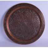 A 19TH CENTURY TURKISH SILVER INLAID COPPER CIRCULAR DISH decorated with extensive scrolling foliage