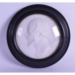 A 19TH CENTURY FRAMED MARBLE PORTRAIT PANEL OF A MALE bearing signature to neck. 12 cm diameter.