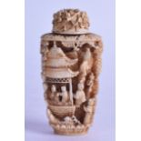 A MID 19TH CENTURY CHINESE CANTON CARVED IVORY SNUFF BOTTLE AND STOPPER decorated with figures in