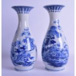 A PAIR OF LATE 19TH CENTURY JAPANESE MEIJI PERIOD BLUE AND WHITE VASES painted with delicate