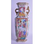 A 19TH CENTURY CHINESE TWIN HANDLED FAMILLE ROSE PORCELAIN VASE painted with figures within