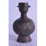 A Persian silver inlaid bronze vase, 10th/12th Century, decorated with script and motifs. 9.25 cm