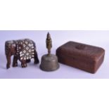 AN EARLY 20TH CENTURY INDIAN IVORY INLAID HARDWOOD ELEPHANT together with an Indian brass bell & a