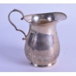 A SILVER CREAM JUG. Sheffield 1944. 4 oz.