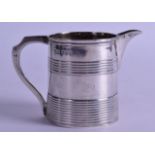 A SILVER CHRISTENING MUG converted to a milk jug. London 1802, altered spout 1885. 3.4 oz.