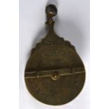 A 19th Century Islamic Bronze Astrolabe, engraved all over with foliage, motifs and calligraphy. 3.