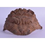 AN UNUSUAL 18TH/19TH CENTURY CARVED WOOD LION MASK HEAD. 15 cm wide.