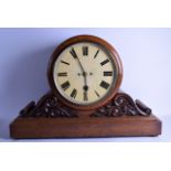 A GOOD VERY LARGE LATE VICTORIAN/EDWARDIAN OAK SHOPS DISPLAY CLOCK with scrolling supports. 80 cm