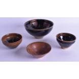 FOUR CHINESE HARES FOOT STYLE STONEWARE BOWLS in various forms and sizes. Largest 14 cm diameter. (