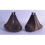 A RARE PAIR OF 18TH CENTURY NORTHERN EUROPEAN CARVED WOOD STIRRUPS decorated with foliage and