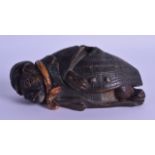 AN UNUSUAL AUSTRIAN PAINTED TERRACOTTA FIGURE OF A SLEEPING BULLDOG. 17.5 cm wide. Minor paint