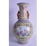 A CHINESE FAMILLE ROSE TWIN HANDLED PORCELAIN VASE bearing Daoguang marks to base, painted with