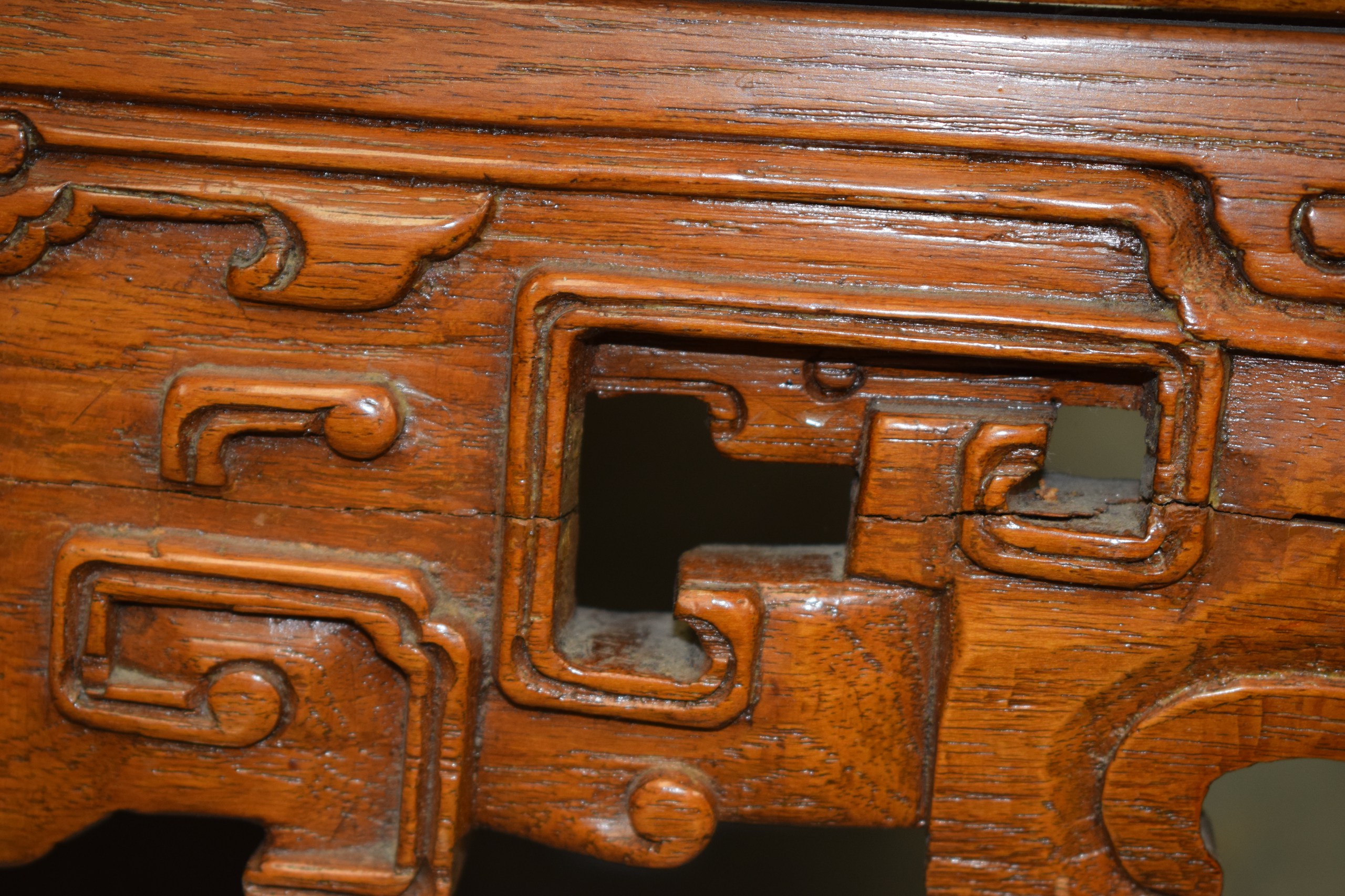 AN EARLY 20TH CENTURY CHINESE CARVED SOFTWOOD LOW TABLE with carved frieze. 80 cm square x 32 cm. - Image 2 of 2