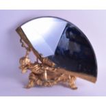 A CONTEMPORARY ORMOLU FAN SHAPED MIRROR depicting a leaning cherub. 32 cm x 28 cm. Minor tarnishing