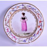 A RARE EARLY 19TH CENTURY ENGLISH PORCELAIN CABINET PLATE unusually painted with a female standing