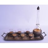 A RARE AND UNUSUAL LATE 19TH CENTURY AESTHETIC MOVEMENT SILVER DECANTER ON TRAY with six matching