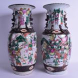 A LARGE PAIR OF LATE 19TH CENTURY CHINESE CRACKLE GLAZED VASES Guangxu, painted with warriors within