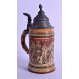 A STYLISH METTLACH STONEWARE STEIN with pewter mounts, decorated with classical figures. 20 cm high.