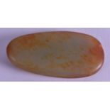 A CHINESE CARVED RUSSET GREEN JADE PEBBLE. 7 cm wide. Good