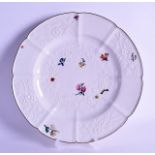 18th c Chelsea early plate with alternating moulded panels and scattered flowers typically