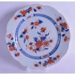 AN EARLY 18TH CENTURY CHINESE IMARI SCALLOPED PLATE Yongzheng, painted with floral sprays. 22.5 cm