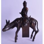 A CHINESE QING DYNASTY BRONZE INCENSE BURNER modelled as a roaming horse with an attendant upon