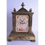 A LATE 19TH CENTURY FRENCH BRONZE AND PORCELAIN MANTEL CLOCK the front panel painted with