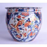 A LARGE 19TH CENTURY JAPANESE MEIJI PERIOD IMARI JARDINIERE painted with birds and extensive