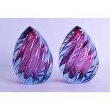 A STYLISH PAIR OF MURANO STYLE PUCE AND BLUE GLASS SCULPTURES. 17.5 cm high.