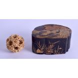 A SMALL 19TH CENTURY CHINESE CARVED IVORY PUZZLE BALL together with a Meiji period black lacquered