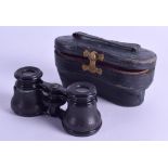 A CASED PAIR OF ANTIQUE FRENCH OPERA GLASSES by Lemaire A Paris. 9.5 cm wide.