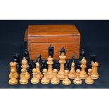 A VINTAGE BOXED CHESS SET, of plain form. King height 10 cm.