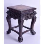 A SMALL LATE 19TH CENTURY CHINESE CARVED HARDWOOD MARBLE INSET STAND of almost Apprentice like form,