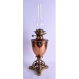 A LATE VICTORIAN COPPER AND BRASS ART NOUVEAU OIL LAMP Attributed to Benson, with scrolling