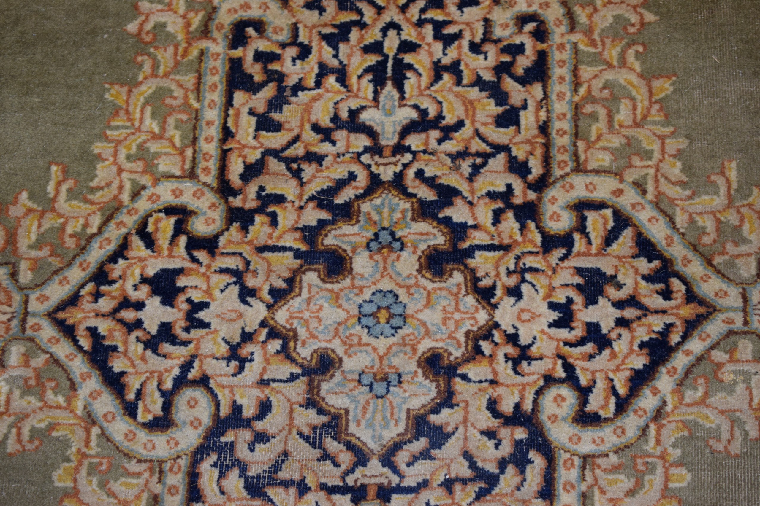 A VERY LARGE GREEN GROUND PART SILK CARPET decorated with motifs. - Image 2 of 4