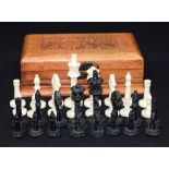 A BOXED EASTERN BONE CHESS SET. 8.6 cm high.