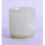 A SMALL CHINESE CARVED GREENISH WHITE JADE BOWL. 5.25 cm high.