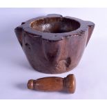 A CHARMING 18TH/19TH CENTURY CARVED WOOD PESTLE AND MORTAR with delightful patina and of