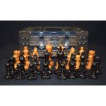 A VINTAGE CASED CHESS SET, inspired by Staunton. King height 11.5 cm.