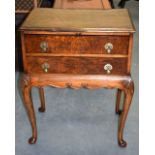 AN ANTIQUE WALNUT CANTEEN OF CUTLERY ON STAND. 76 cm x 59 cm.