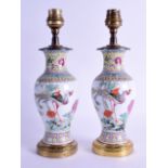 A PAIR OF CHINESE REPUBLICAN PERIOD VASES converted to lamps, painted with a bird within a