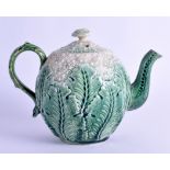 A 19TH CENTURY CONTINENTAL CABBAGE LEAF TEAPOT AND COVER in the manner of Whieldon. 16 cm wide.